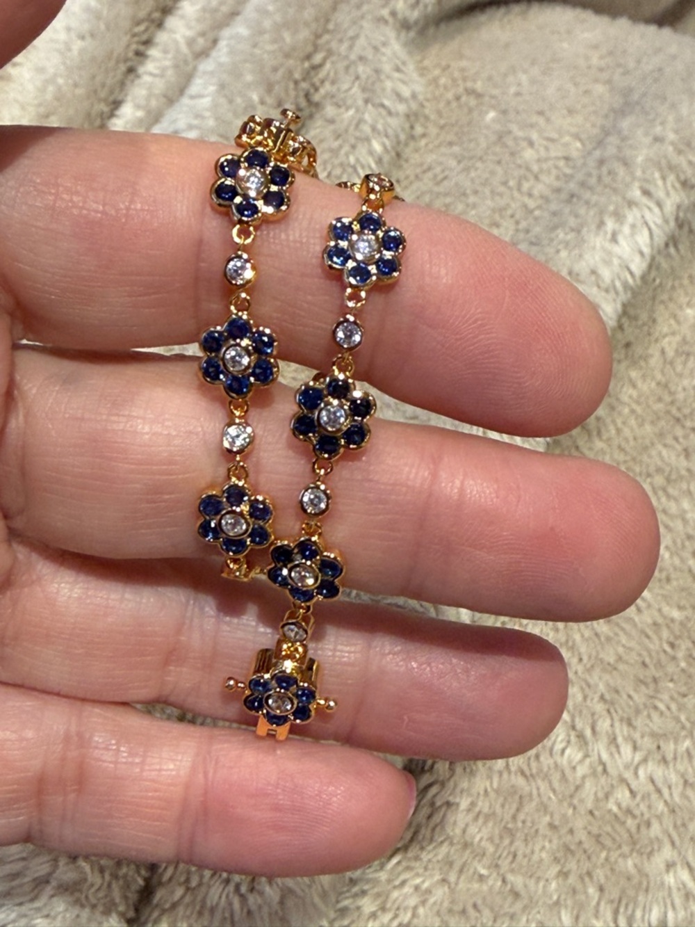 SS Gold overlay Floral Bracelet with Blue and Clear Stones